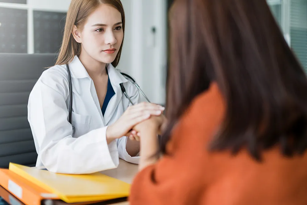 Doctor consulting with patient during medical appointment