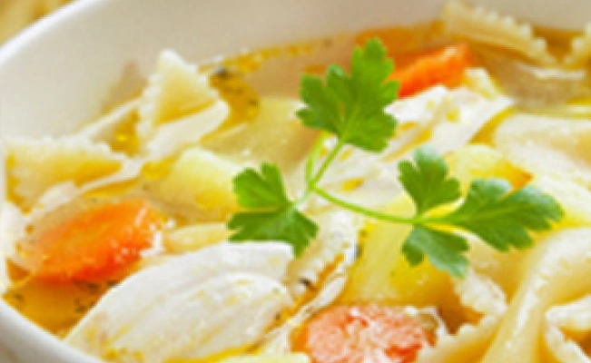 Close-up of a bowl of chicken sopas