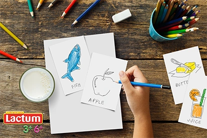 Top shot of child drawing foods.