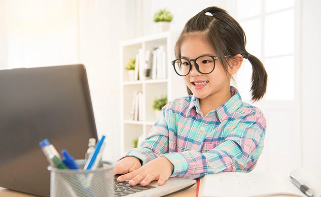 Child learning on computer 