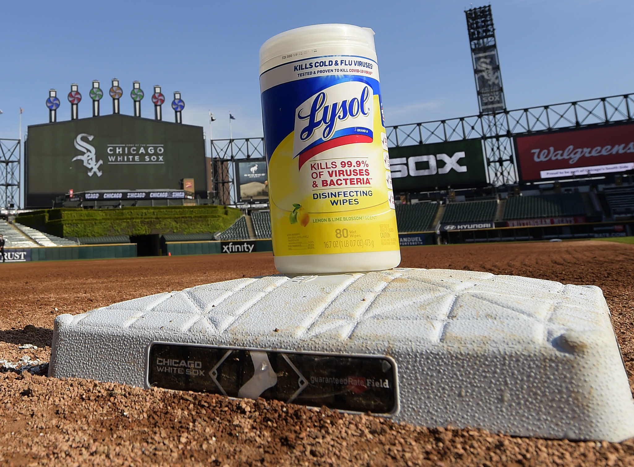 Lysol disinfecting wipes container on a baseball field at Chicago White Sox stadium