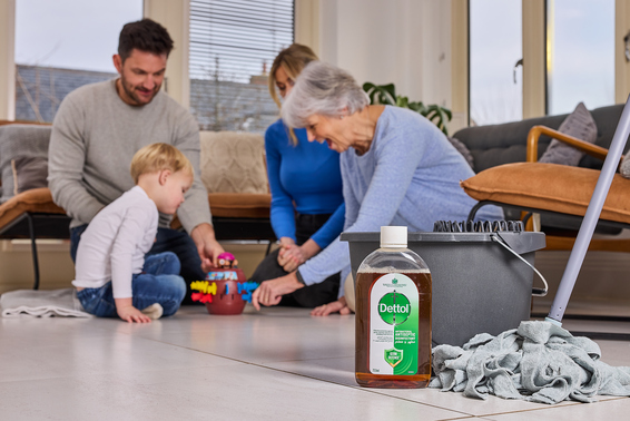 Family spending time together at home with Dettol cleaning products