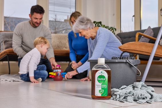 Family spending time together at home with Dettol cleaning products