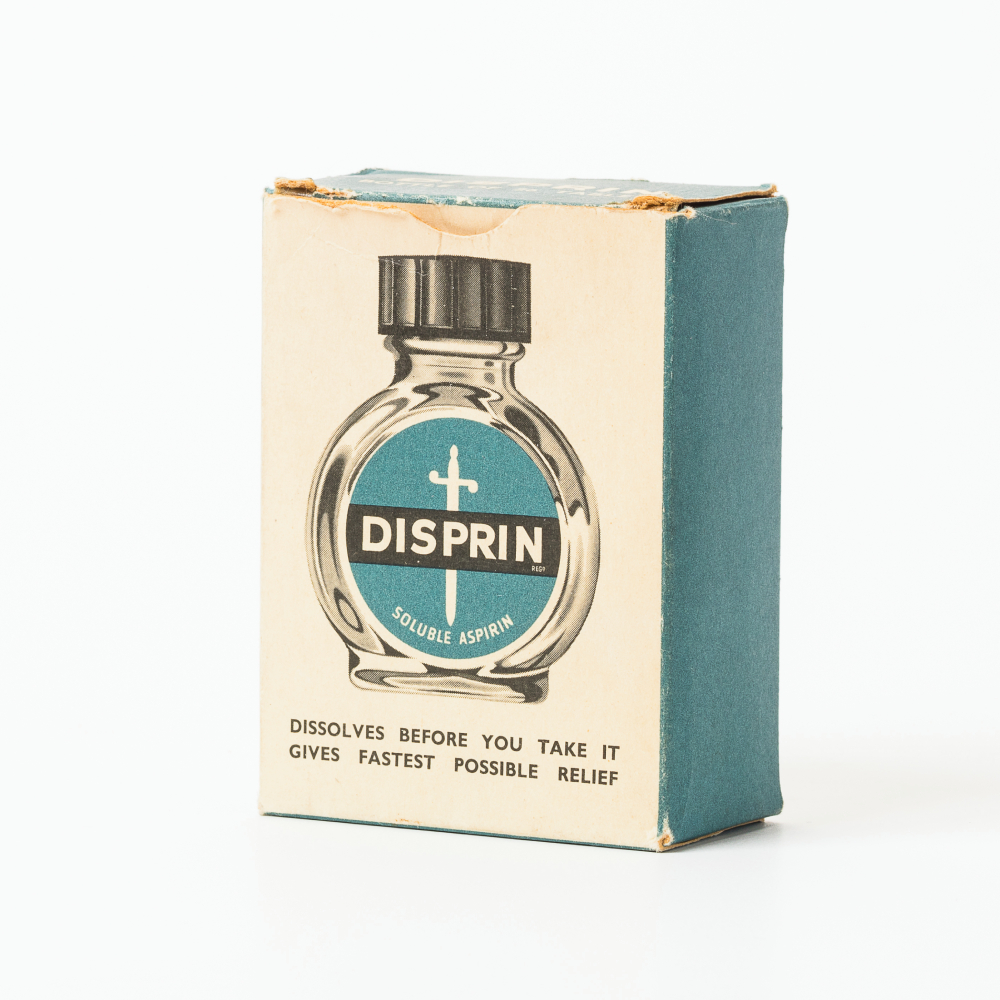 Vintage Disprin aspirin box with a bottle illustration on the front.