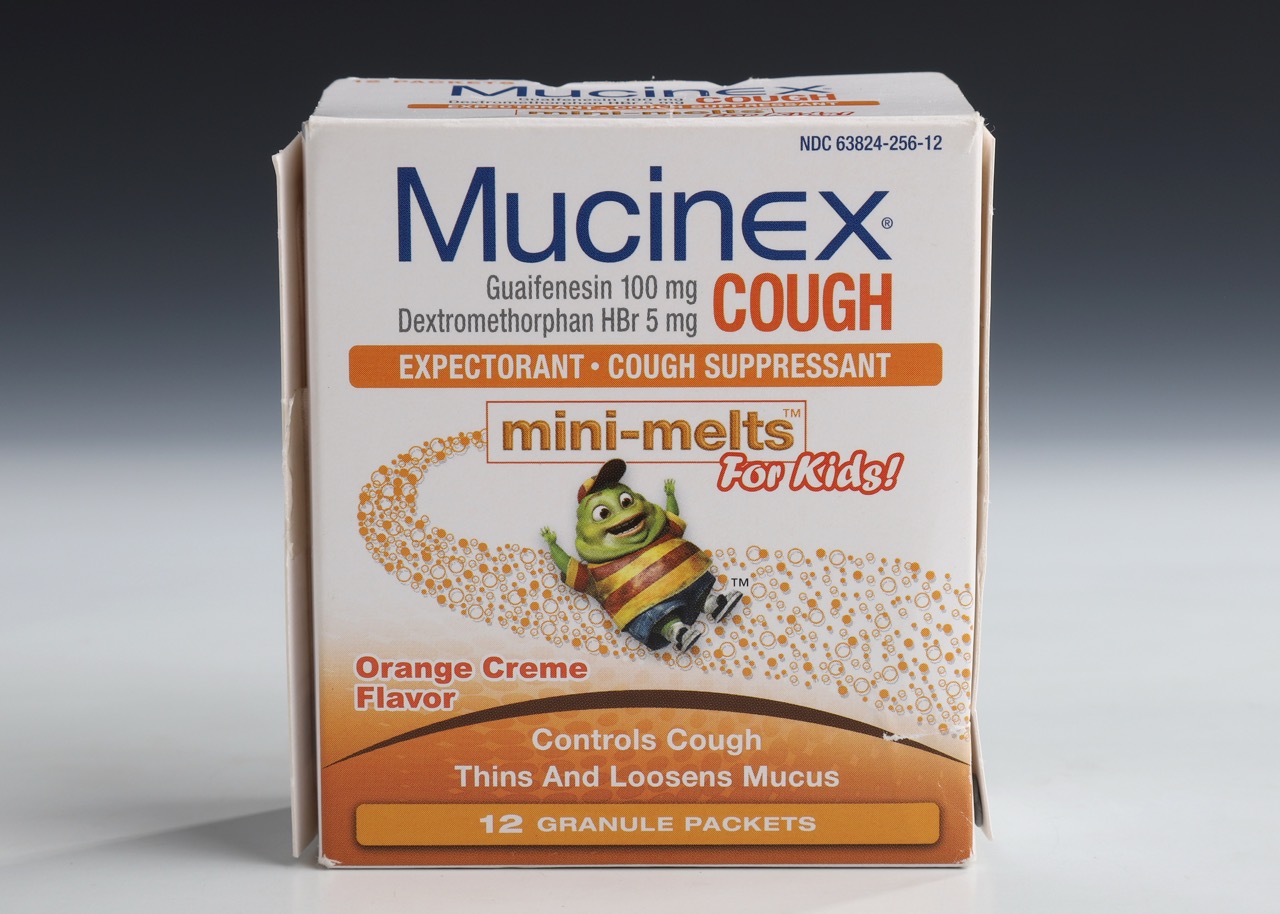 Mucinex cough medicine for kids in orange cream flavor box.