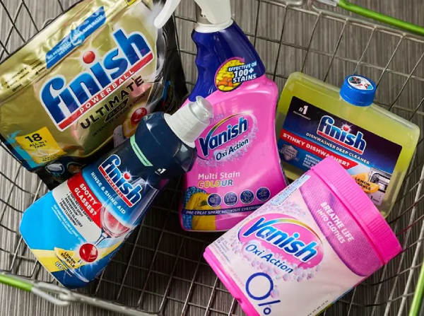 Assortment of Finish and Vanish cleaning products in a shopping basket.