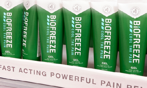 Rows of Biofreeze gel tubes displayed on a retail shelf.