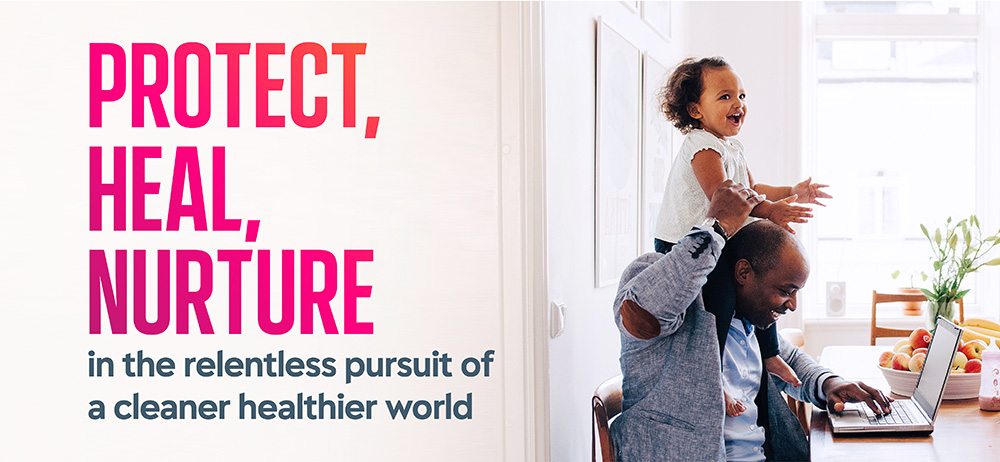 Text reading “Protect, Heal, Nurture” beside a man working on a laptop with a child on his shoulders