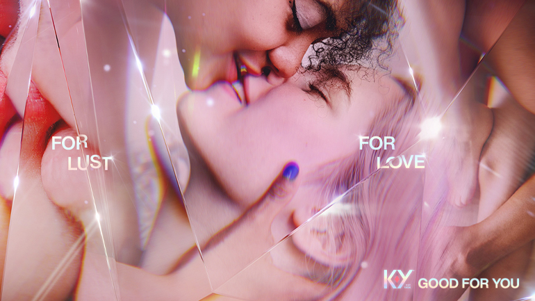 The image features a stylized, close-up depiction of intimate contact with sparkling light effects, accompanied by the text "FOR LUST" and "KY GOOD FOR YOU."