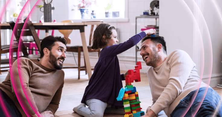 Family spending time together at home, playing and laughing