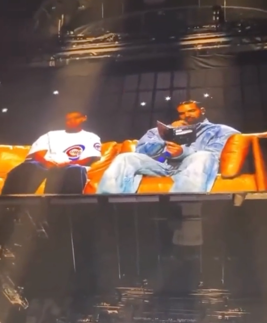 The truth behind the 'hologram' that handed Drake a book at