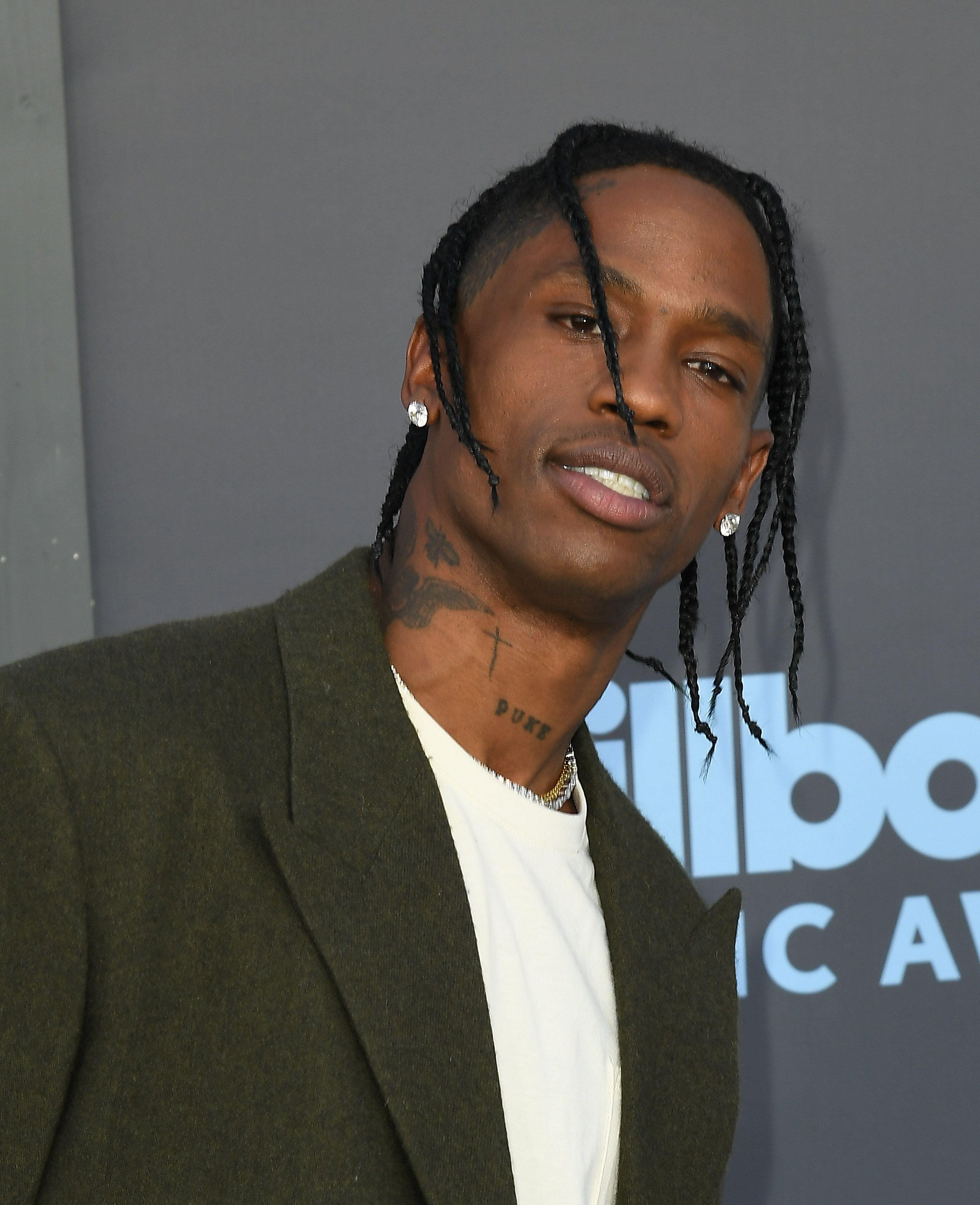 Travis Scott gets himself in new trouble after punching sound engineer in  the face