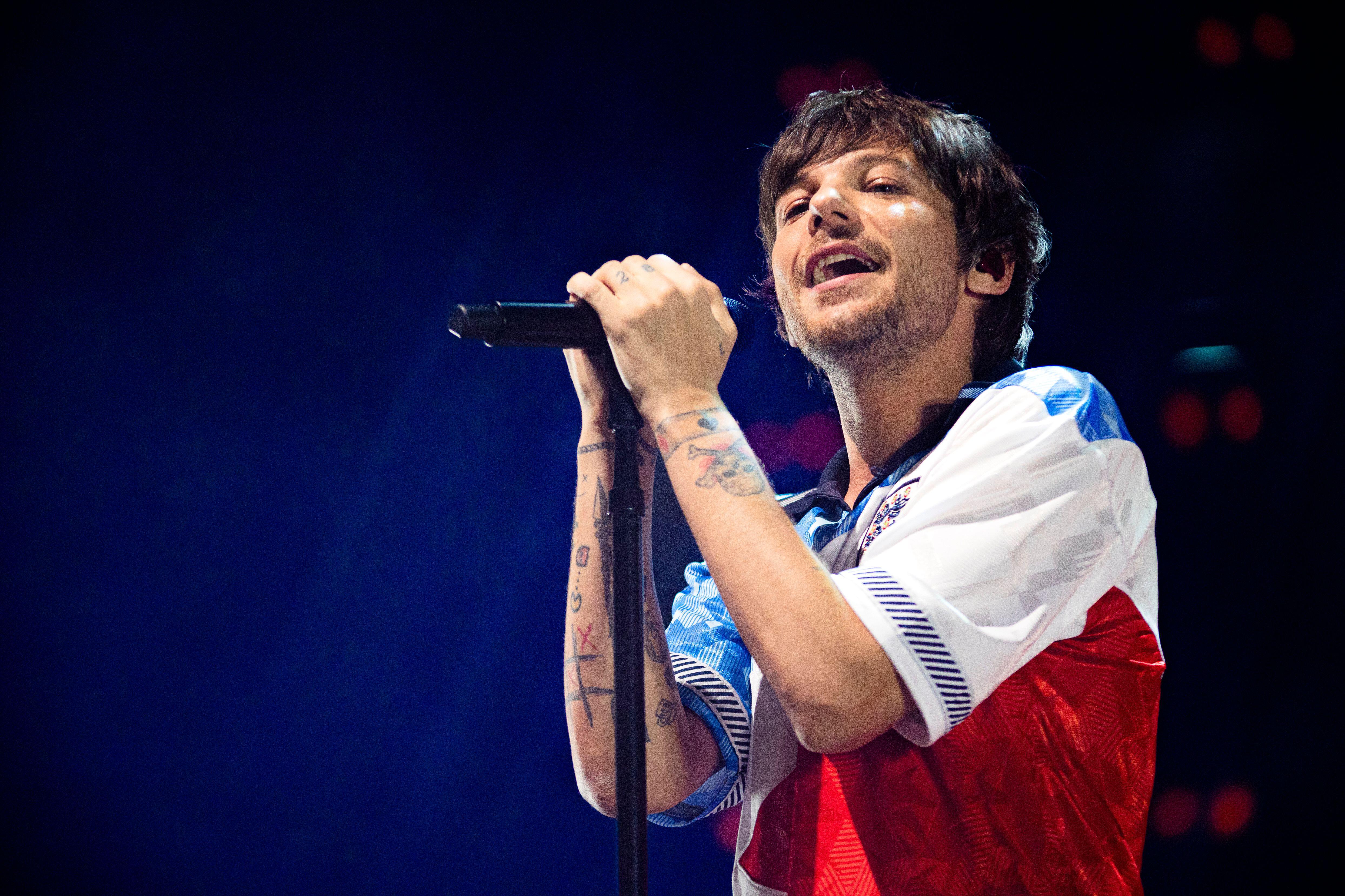 Louis Tomlinson admits to 'envy' at the beginning of Harry Styles' solo  career