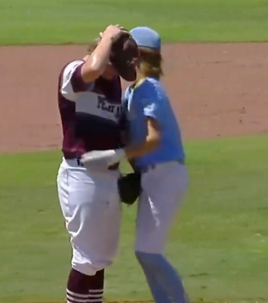 Little League batter comforts distraught pitcher who accidentally hit him  in the head