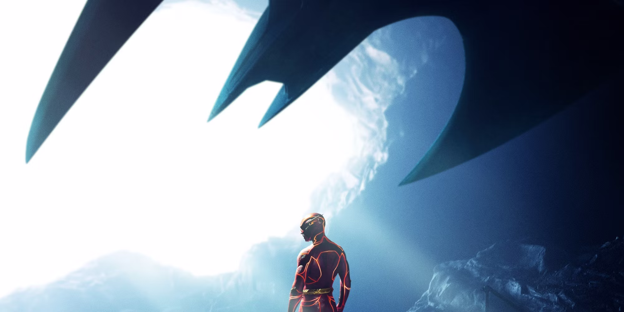 The poster for the movie teases the clash of two superhero worlds. Credit: Warner Bros.