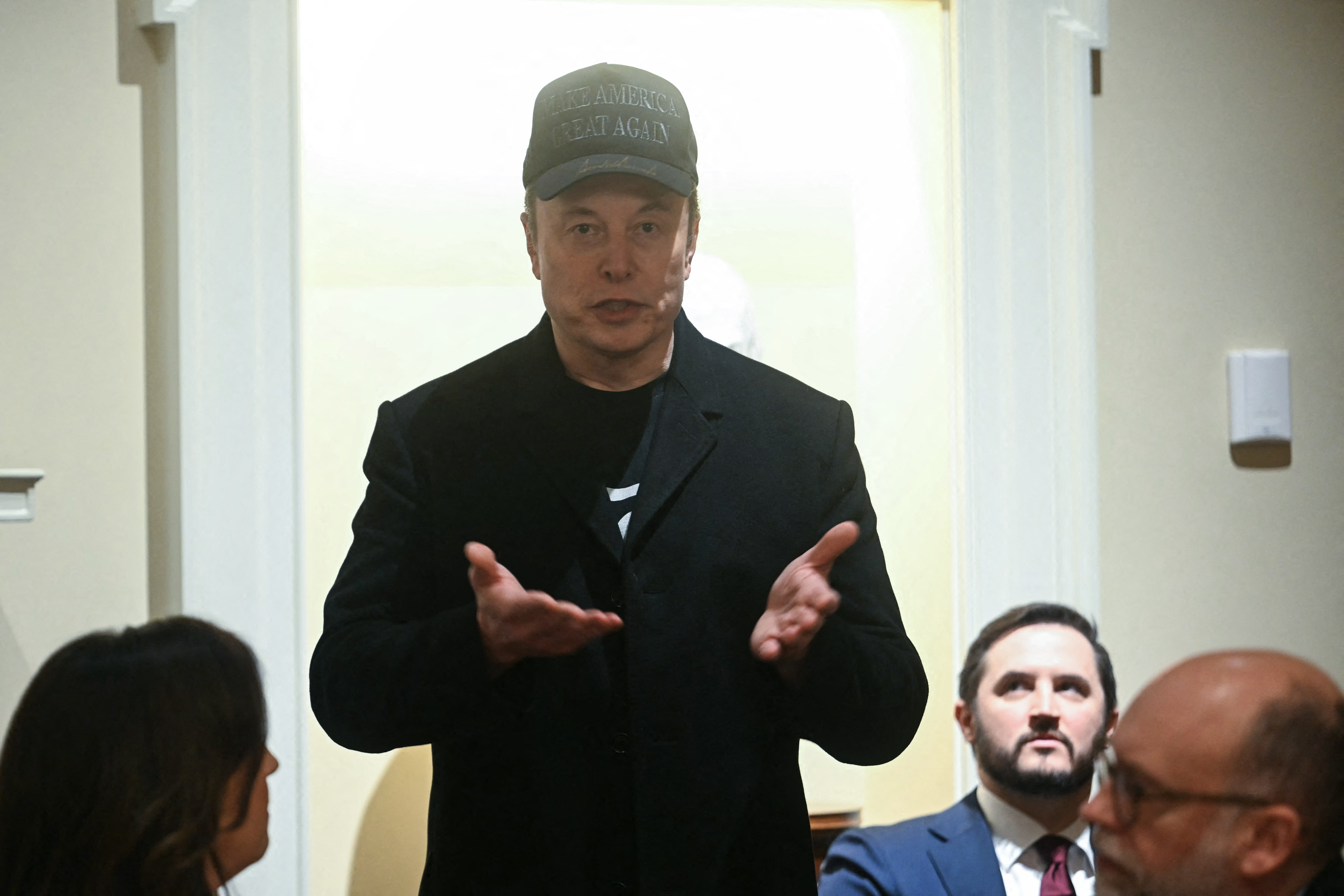 Elon Musk savagely trolled after people spot what was written on his piece  of paper during cabinet meeting