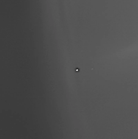 Orbiter takes rare picture of Earth 180,000,000 miles away on Mars