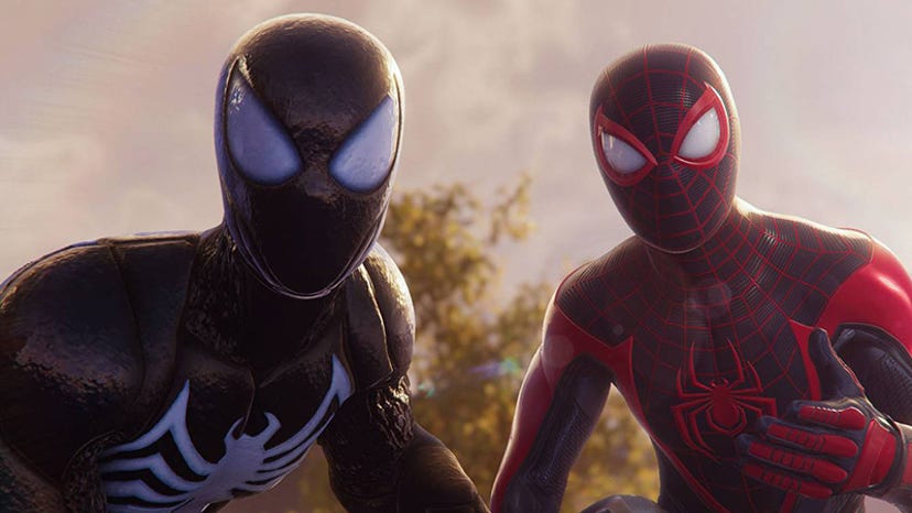 A screencap from the trailer for Marvel's Spider-Man 2. Peter Parker and Miles Morales crouch next to each other.