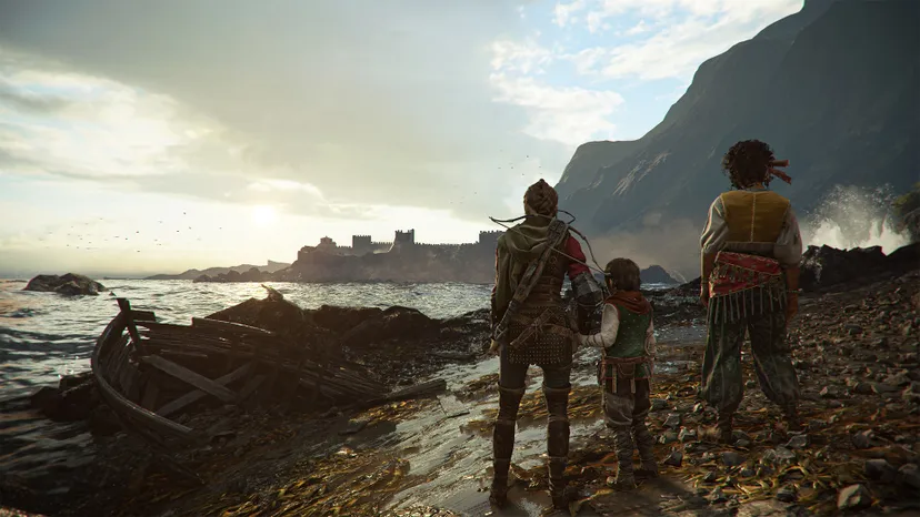 A screenshot from A Plague Tale: Requiem. Amicia, Hugo, and new friend Sophia stand on the beach.