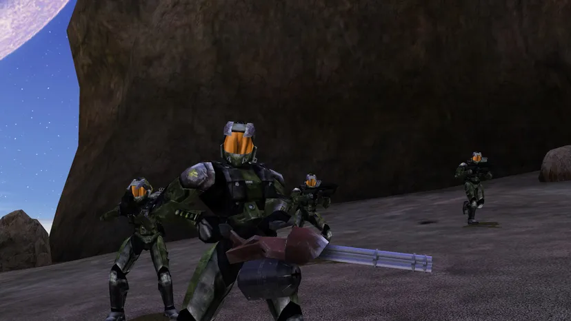 Classic Spartans wielding weapons from the 199 version of Halo.