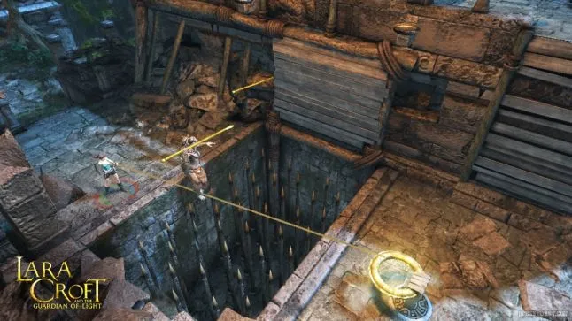 Players must work together to traverse the obstacles presented in Lara Croft and the Guardian of Light. Source: http://laracroftandtheguardianoflight.com