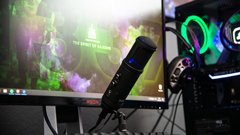 A micophone and desktop setup used for streaming video games