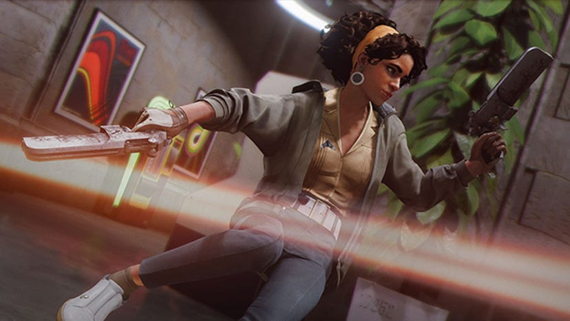 a screenshot from Deathloop. Antagonist Julianna vaults over a barrier while duel-wielding pistols.