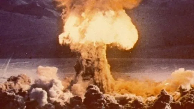 The explosion of an atomic bomb.
