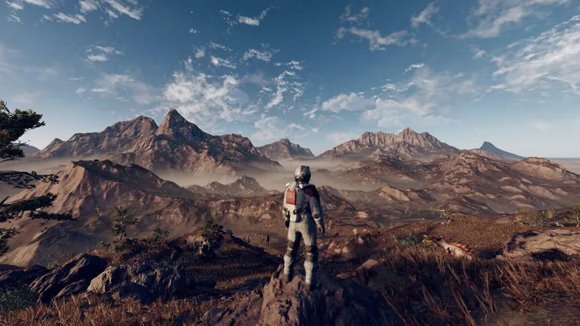 A screenshot of Starfield. The player character looks out over a barren planet.