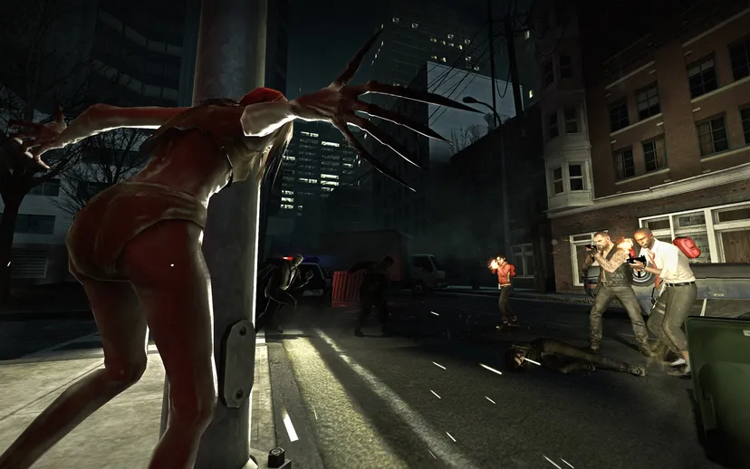 The Left 4 Dead survivors stare down a Witch zombie on a city street