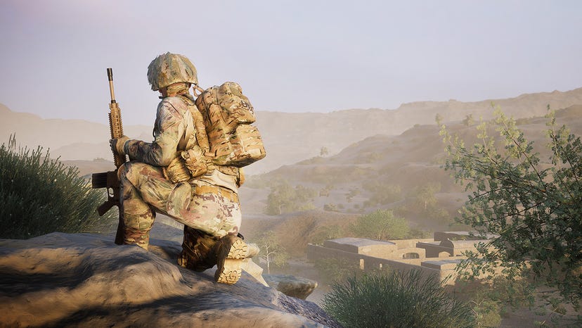A screenshot from Squad depicting a lone soldier perched on a dusty hilltop