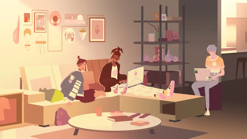 three people seated around a couch with computers
