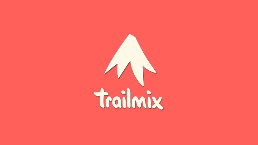 The Trailmix logo on a soft red background