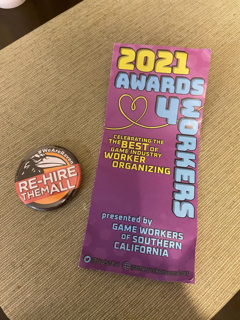 A brochure and button handed out by Game Workers of Southern California