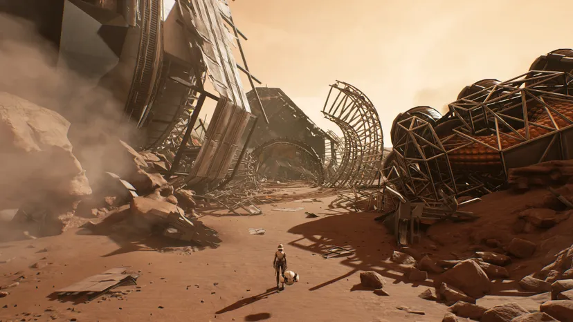 A lone figure looks out at a desert landscape of broken ruins in a screenshot from Deliver Us Mars.