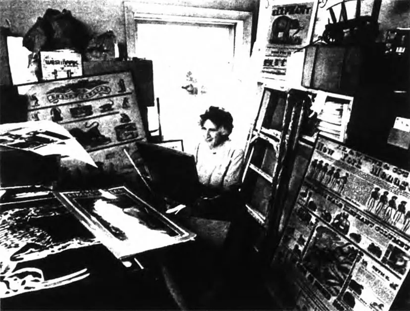 A photograph of Mabel Addis in front of an IBM computer.