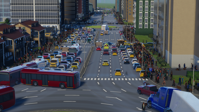 Traffic struggling to adapt to a roundabout placed at a busy urban intersection