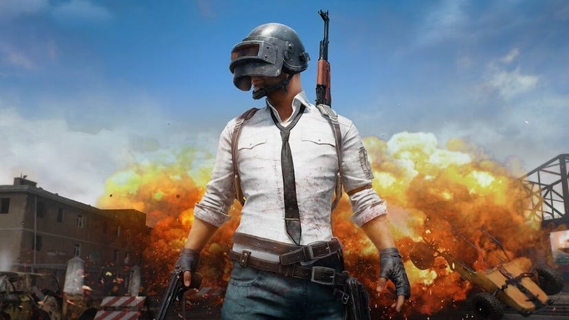 Key art for Krafton's PUBG: Battlegrounds of a soldier behind a flaming background.