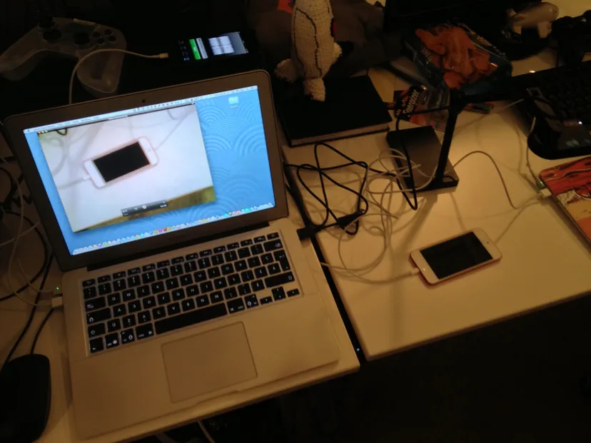 The setup: iPod, camera, timer, and laptop for recording.