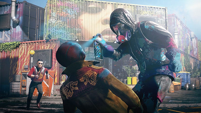 A screenshot from Watch Dogs Legion. One character spray-paints another. 