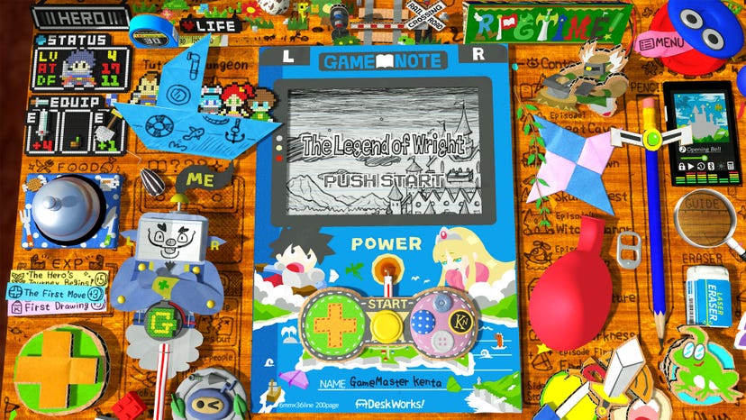 a hand-crafted handheld game system with several crafts and construction paper characters