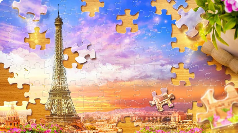 Promotional Art for Magic Jigsaw Puzzles depicting the Eiffel Tower.