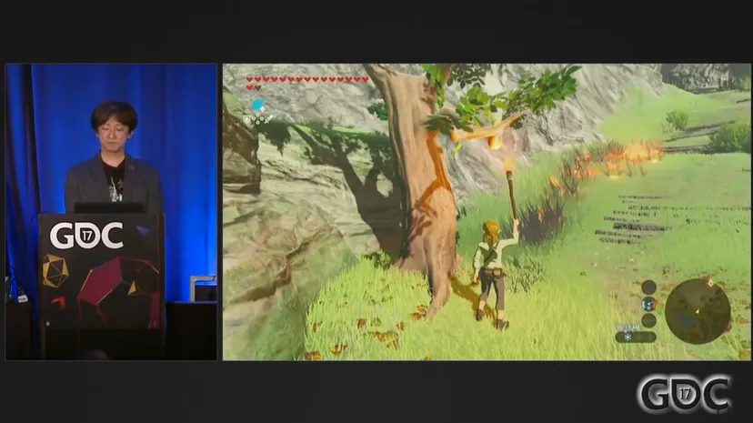 A slide from GDC 2017 shows Link baking an apple by holding a torch up to a tree.