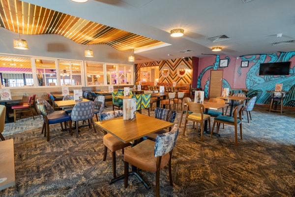 The seating area of the restaurant at Golden Sands Holiday Park in Devon