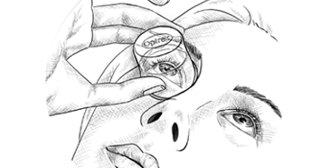  Female using Optrex Eye Wash with Eye Bath