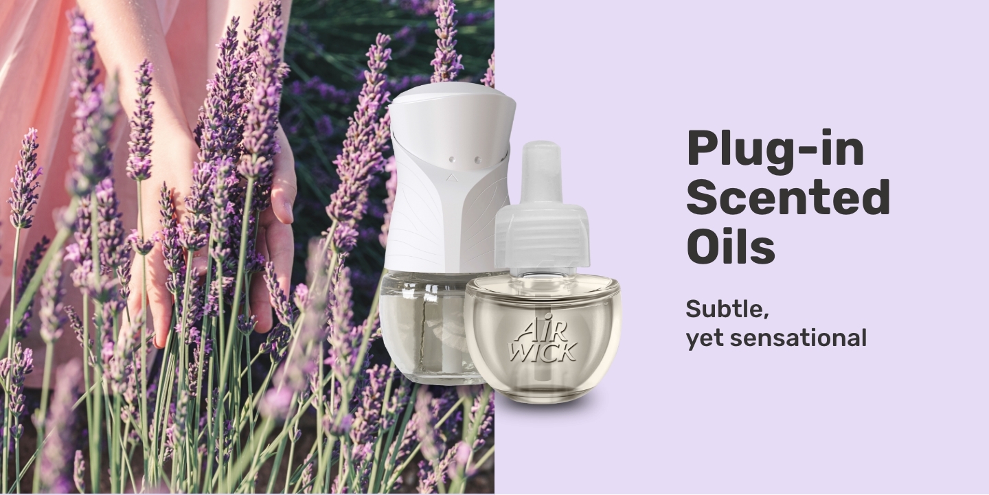 Image: Displays Air Wick® Plug-in Scented Oil warmer device and single refill with a background of a field of lavender. Headline Reads: Plug-in Scented Oils. Subhead Reads: Subtle, yet sensational.