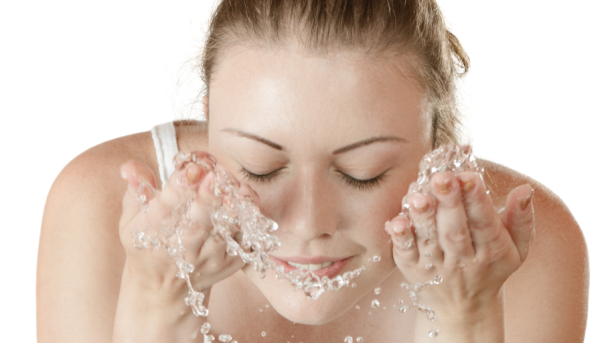  Female washing her face