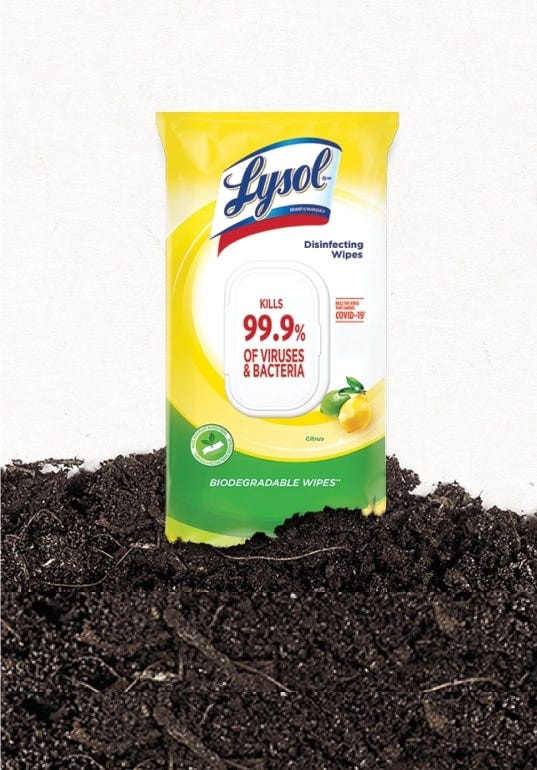 Lysol Biodegradable Disinfecting Wipes displayed on top of soil