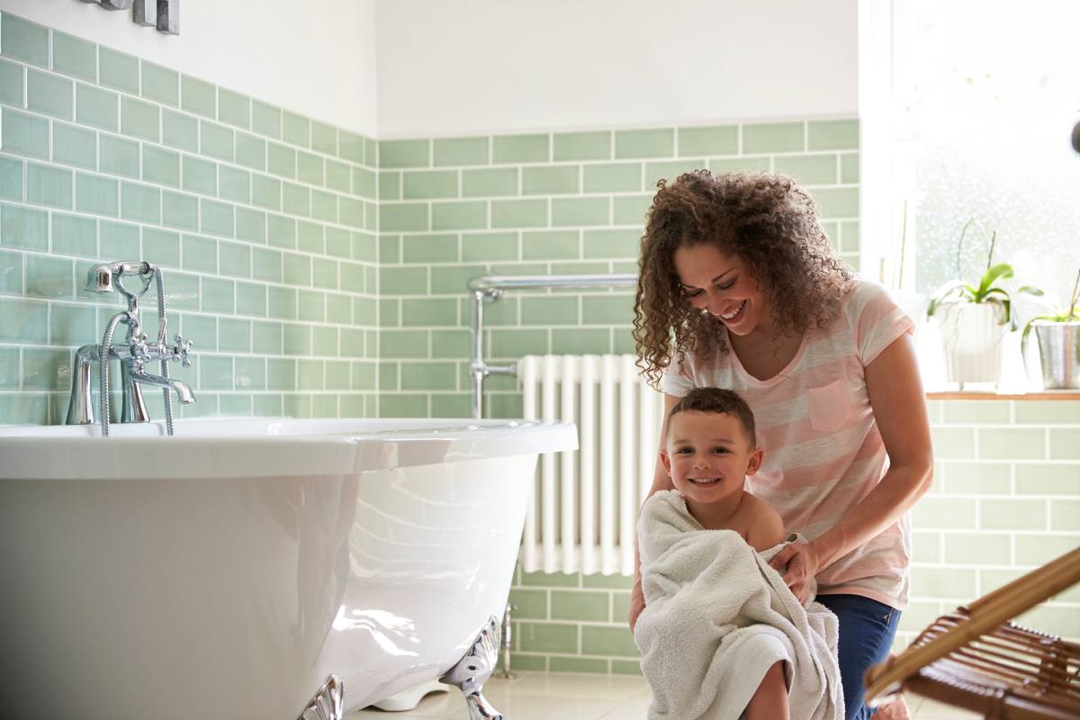 mom wiping baby after bath