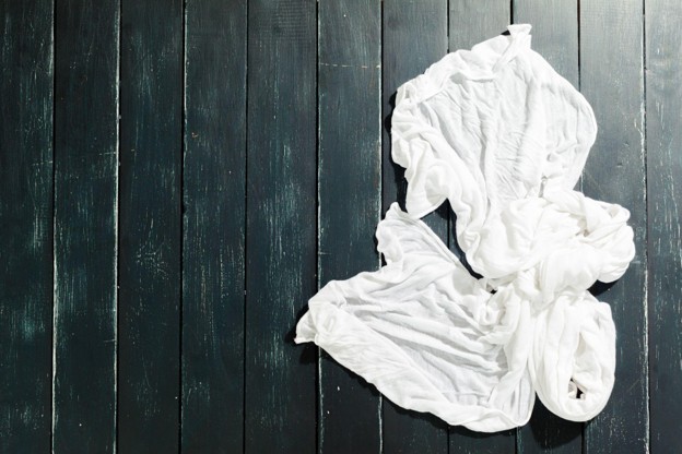 A top-down view of a wrinkled shirt.